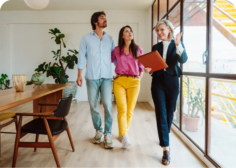 Real estate agent showing modern apartment.
