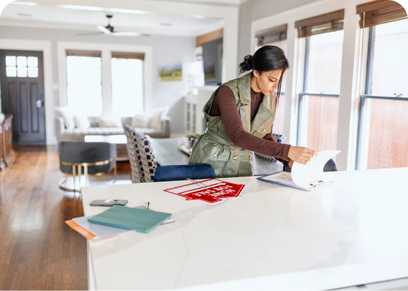Professional organizing paperwork on kitchen counter